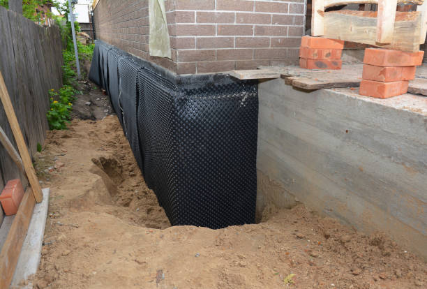 SJ Waterproofing Pros technician performing targeted Crawl Space Encapsulation assessment in Gladstone, MI